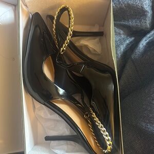 Sophisticated Black and Gold Patent Leather Heels